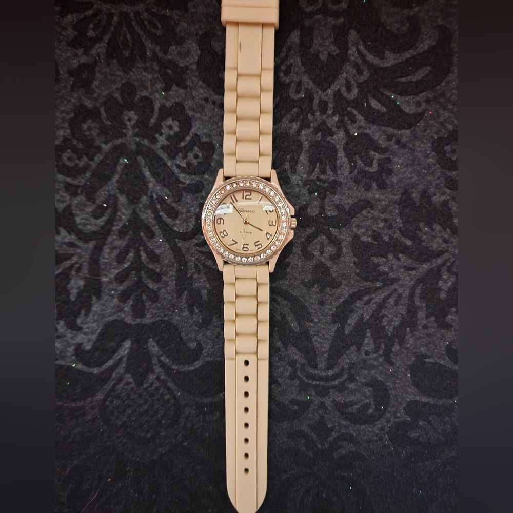 Charming Charlie Beige Watch With Rubber Band Crystal Face.